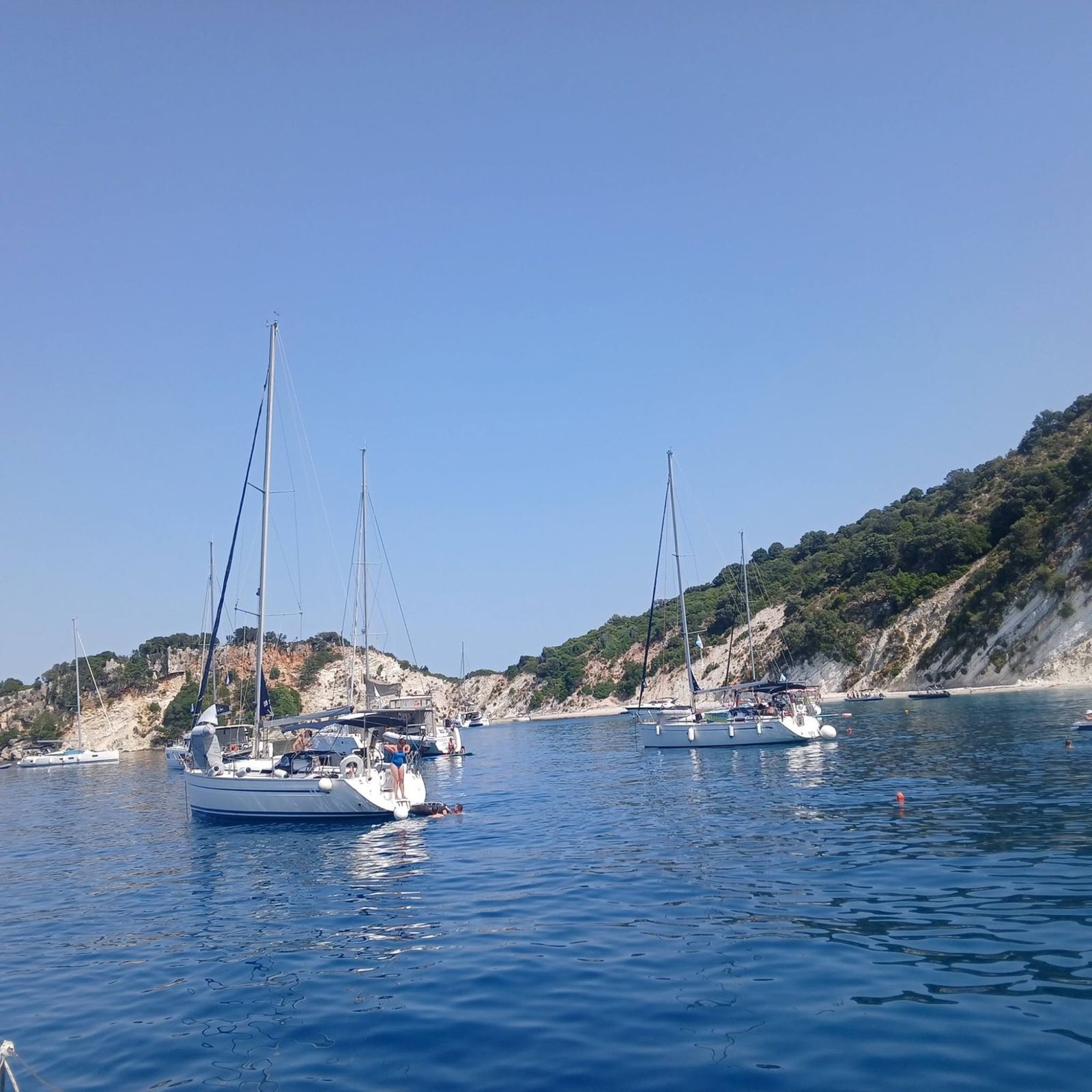 AIyachts charter yachts moored stern-to on a Greek island quay